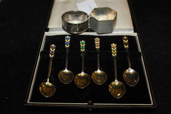 Set of 6 silver and enamel coffee spoons and 2 silver napkin rings